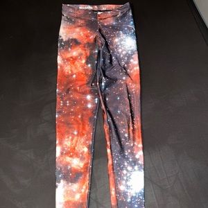 XS Red Galaxy leggings by Blackmilk Clothing